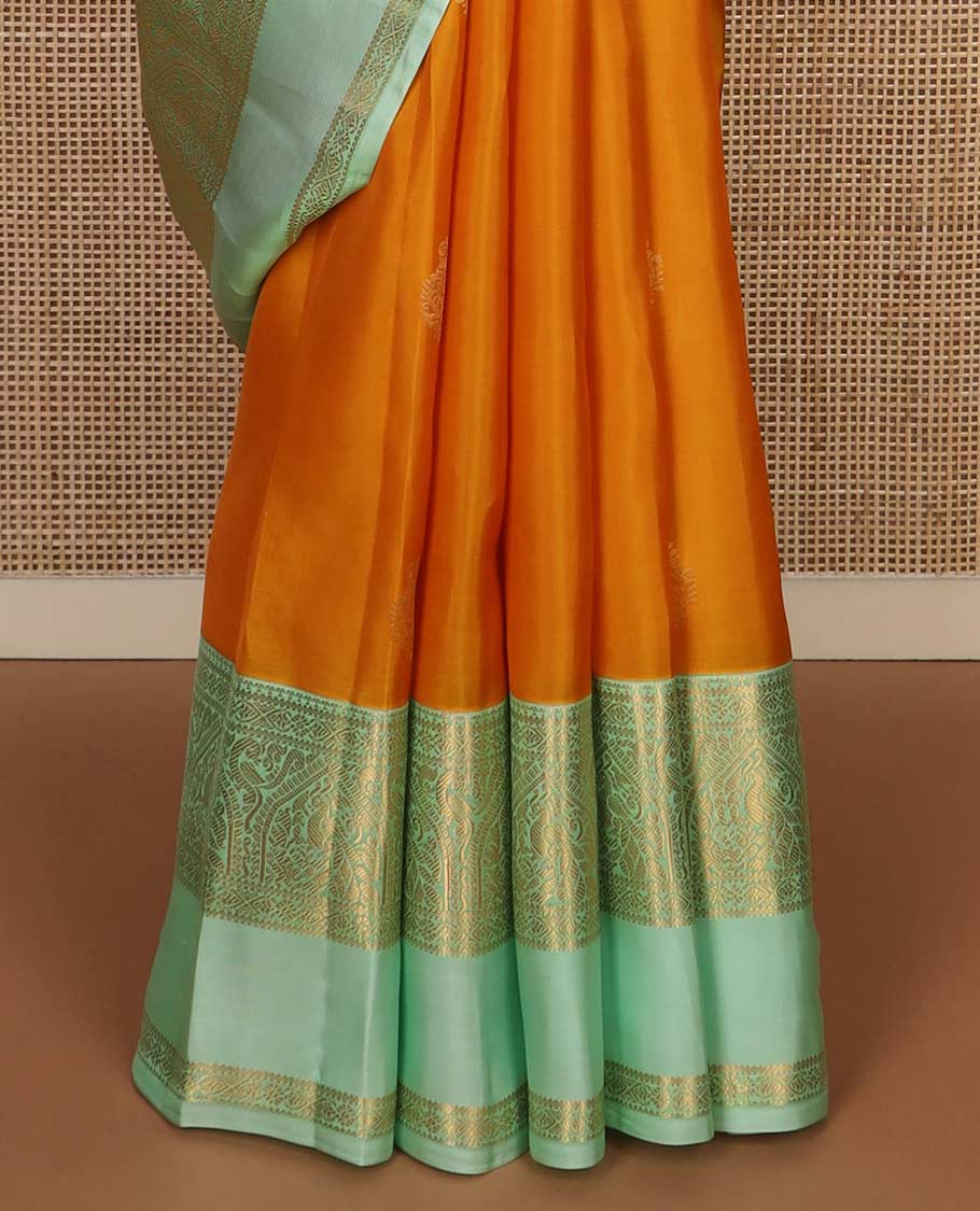 Orange zari buttas Vasundhara silk mix saree, contrast border rettai pettu of mayil designs, and jaal pallu