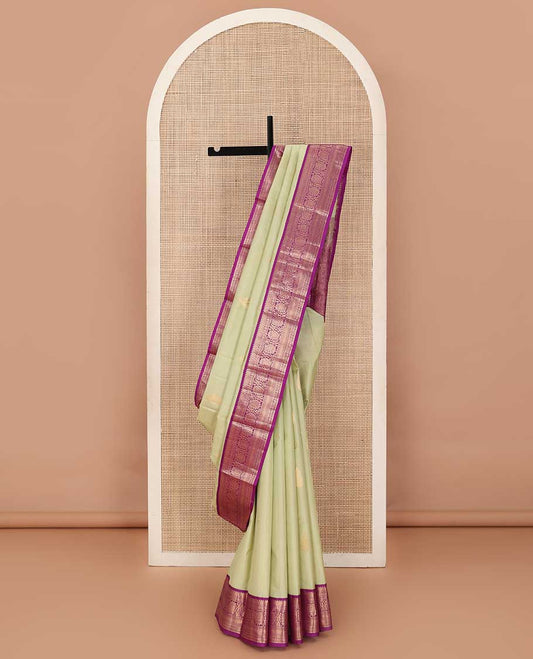 Sandal zari buttas silk saree, contrast border of thilakam, jada nagam, neli and kodi visiry and pallu of diagonally woven kodi manga and geometric designs