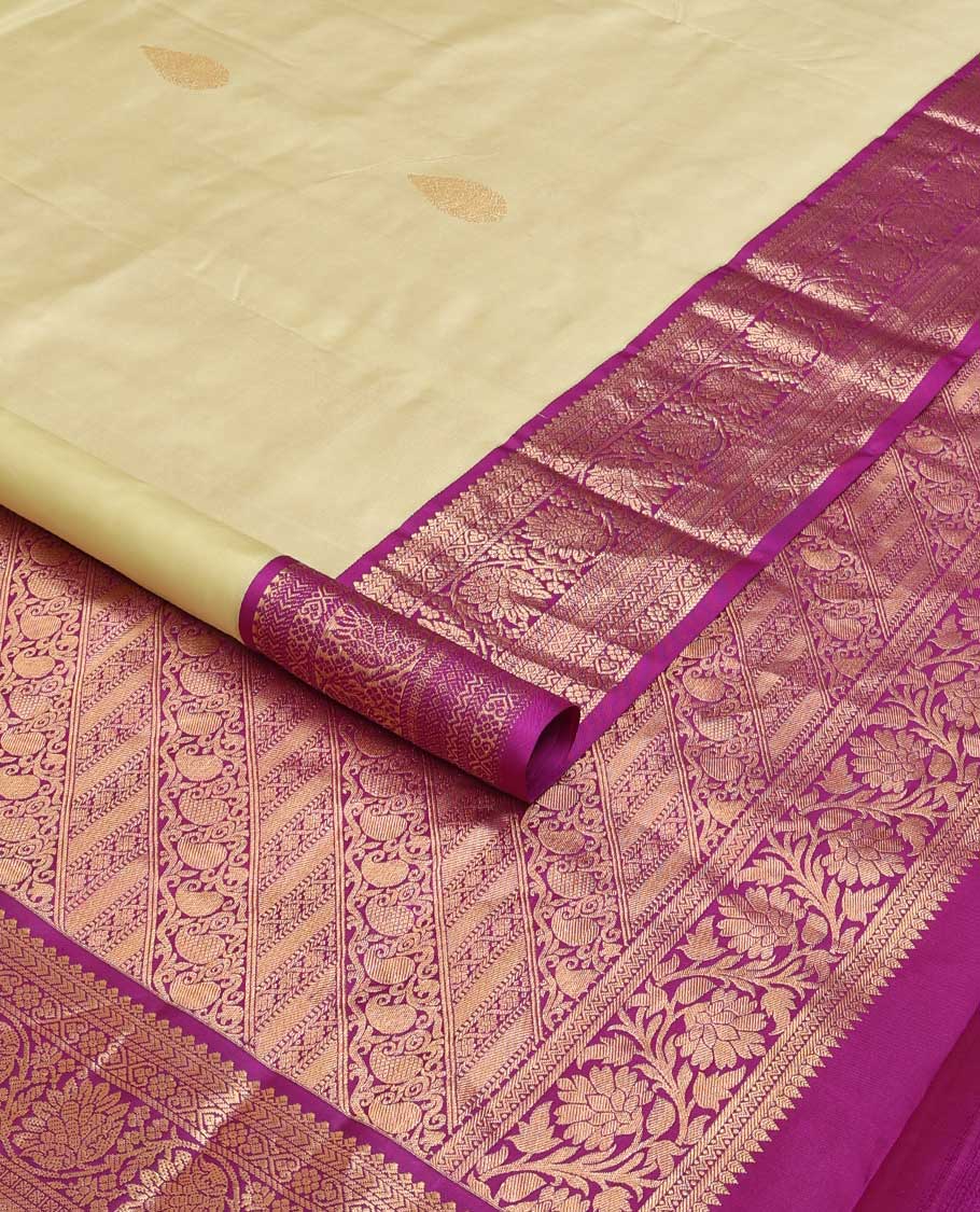 Sandal zari buttas silk saree, contrast border of thilakam, jada nagam, neli and kodi visiry and pallu of diagonally woven kodi manga and geometric designs