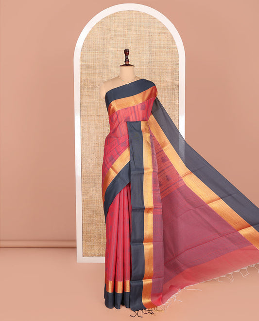 Red Semi-Silk Cotton Saree, Sparsely Woven with Buttas and Stripes All Over Its Body, Complemented by a Contrast Border of Traditional Zari Designs, Pallu of Jaal Designs, and Paired with a Matching Blouse