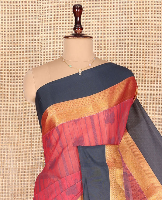 Red Semi-Silk Cotton Saree, Sparsely Woven with Buttas and Stripes All Over Its Body, Complemented by a Contrast Border of Traditional Zari Designs, Pallu of Jaal Designs, and Paired with a Matching Blouse