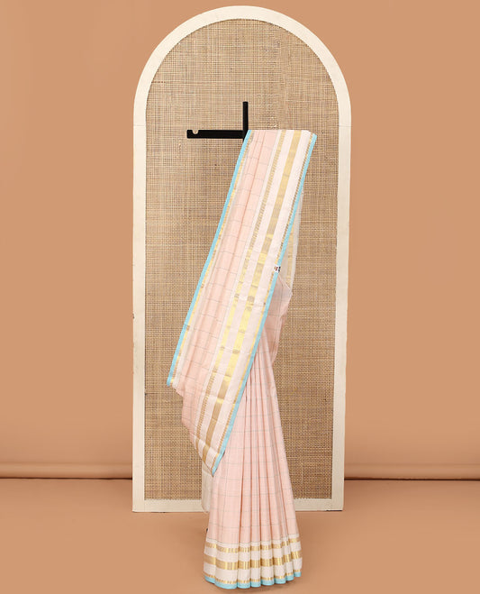 Baby pink checked Kanchipuram silk saree, contrast varisai pettu border of thilakam mokku, manga, and kuyil kann designs, and seppu rekku pallu