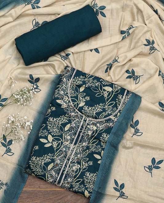 Blue material chudidar set, floral print with neck embroidered top, plain bottom, and a contrast floral printed dupatta