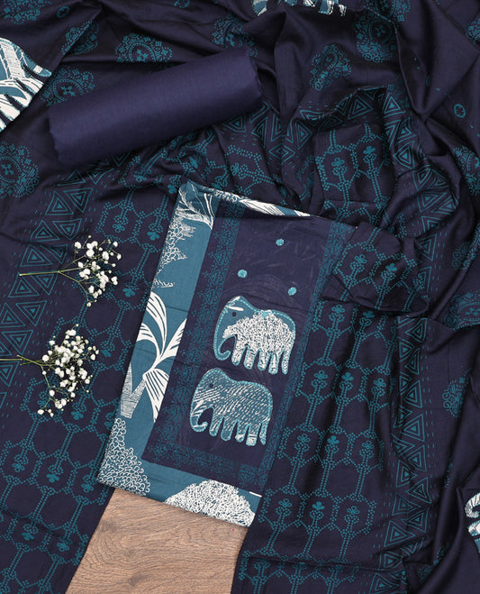 Blue Material Chudidar Set, Adorned with Tropical Floral and Building Print and Neck Embroidery on Cotton Top, a Contrast Plain Cotton Bottom, and Paired with a Geometric Printed Matching Cotton Dupatta