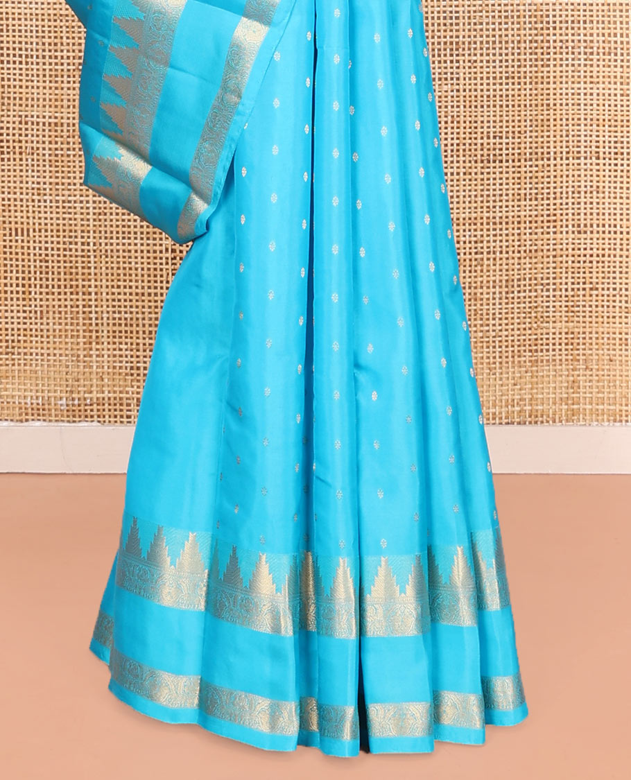 Blue Vasundhara Lite Silk Mix Saree, Subtly Sparkled with Zari Buttas All Over Its Body, Highlighted by a Zari Rettai Pettu Border of Thazampoo Rekku, Salngai, Yaanai and Mayil Designs, Gleaming Jaal Pallu, and Paired with a Matching Blouse