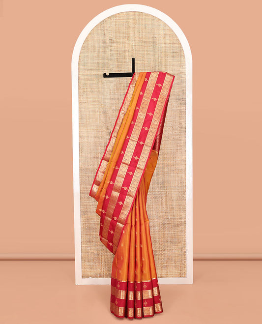 Orange Vasundhara Silk Mix Saree, Richly Woven with Zari Buttas All Over Its Body, Complemented by Contrast Border of Peacock Designs, Grand Jaal Pallu, and Paired with a Contrast Blouse