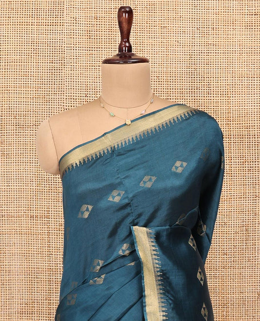 Blue Banana Pith Saree, Adorned with Buttas All Over Its Body, Highlighted by Temple Zari Border, Gleaming Zari Striped Pallu, and Paired with a Matching Blouse