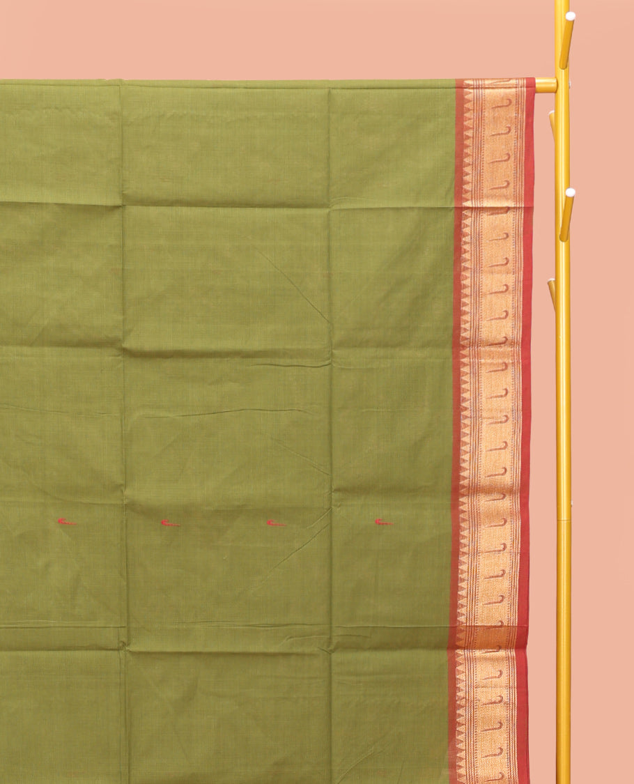 Green Chettinad Cotton Saree, Steeped with Muniya Buttas On Its Body, Complemented by a Contrast Traditional Muniya Border, Pallu of Stripes, and Paired with a Matching Blouse