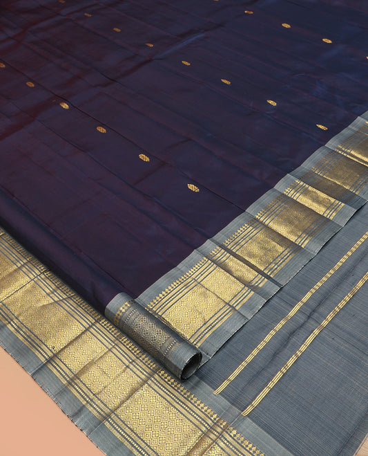 Blue Kanchipuram Silk Saree, Woven with Zari Buttas, Complemented by a Contrast Border of Panner Sombu, Banaras, Muthu, and Jaal Design, Zari Design Pallu, and No Blouse