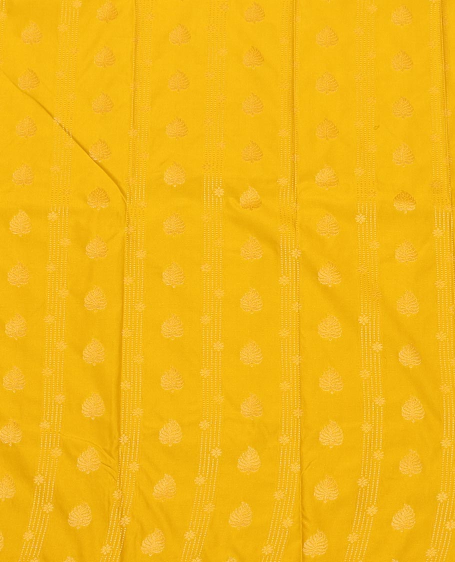 Yellow Art Silk Pavadai Material Set Sparsely Woven with Buttas and Stripes on Its Skirt, Complemented by a Contrast Jaal Zari Design Border, and Paired with a Contrast Blouse
