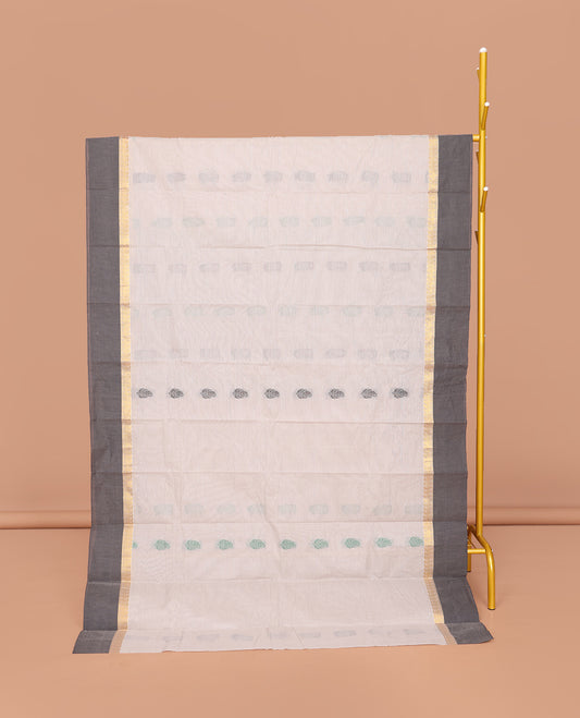 Off-White Kanchi Cotton Saree, Decked Up with Buttas All Over Its Body, Complemented by a Contrast Border, Pallu of Paisley Designs, and Paired with a Matching Blouse