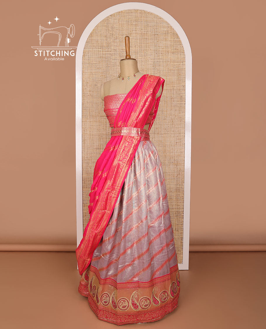 Grey striped tissue half saree with contrast paisley design border, zari design blouse & floral design dhavani