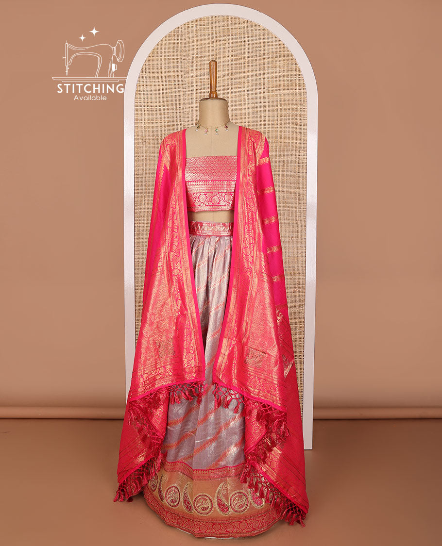 Grey striped tissue half saree with contrast paisley design border, zari design blouse & floral design dhavani