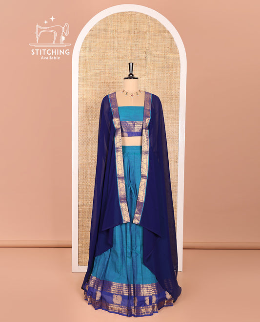 Blue and Dark Blue Sungudi Cotton Half-Saree Featuring Plain Skirt, Adorned with a Contrast Traditional Motifs Woven Zari Border of Annam Motifs, Paired with a Matching Blouse, and Contrast Syska Georgette Dhavani with Zari Border