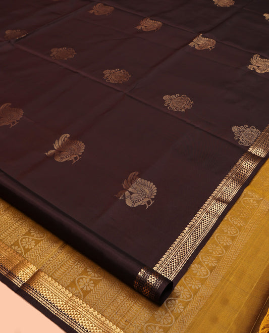 Brown Mayuri Soft Silk Saree, Elevated with Zari Buttas All Over Its Body, Highlighted by Zari Border of Manga Mokku, Banaras, Kathir, and Ara Maadam Designs, Complemented by Contrast Pallu, and Paired with a Contrast Blouse