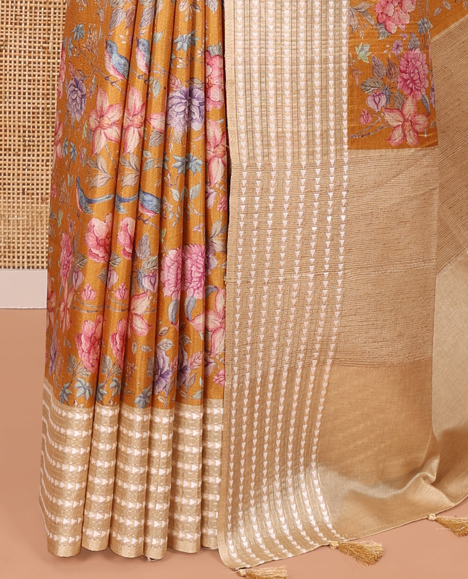 Mustard colorful floral motifs printed fancy tussar saree, contrast triangle motifs border, striped pallu, and a contrast striped blouse