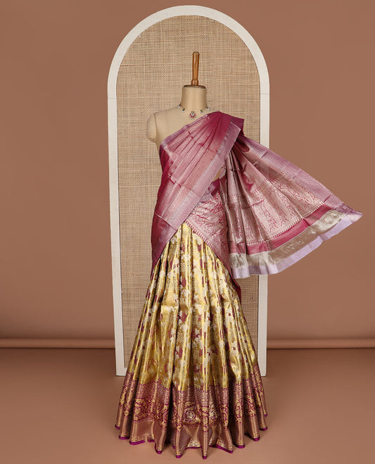 Green pure silk half saree, floral jacquard skirt, contrast jacquard blouse and Mughal style border, and intricate dhavani