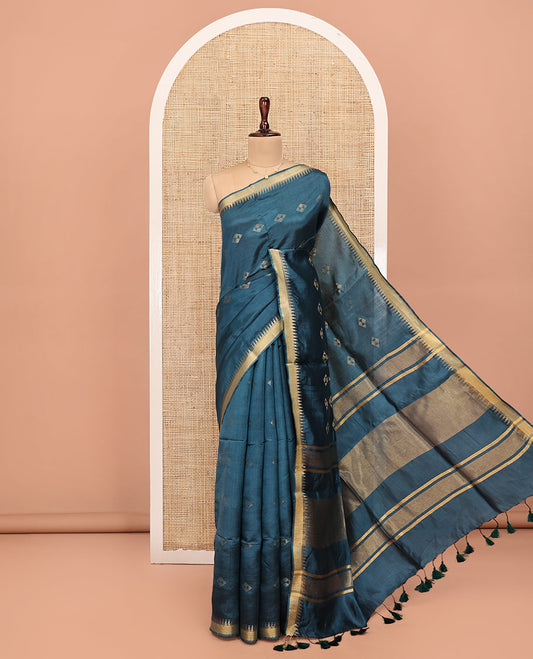 Blue Banana Pith Saree, Adorned with Buttas All Over Its Body, Highlighted by Temple Zari Border, Gleaming Zari Striped Pallu, and Paired with a Matching Blouse