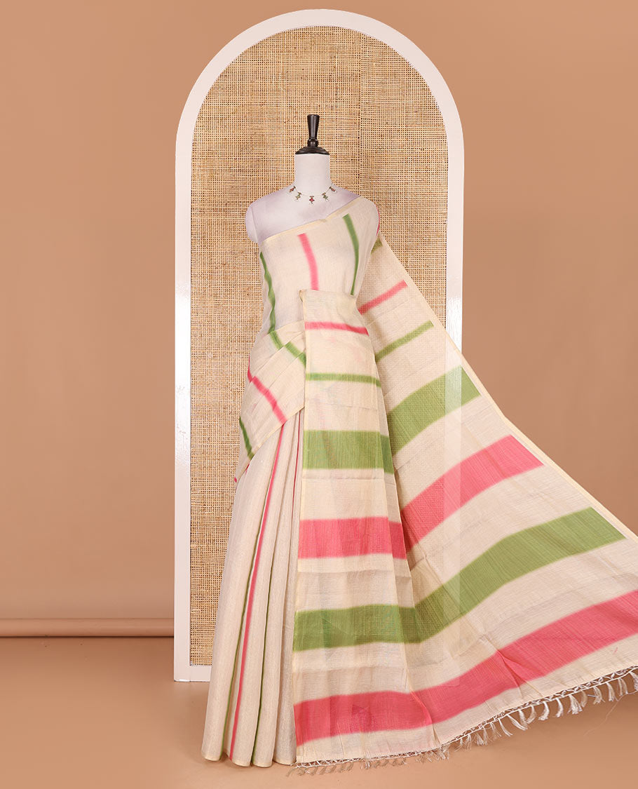 Borderless cream, colorful striped tissue saree, unique motifs printed pink color blouse