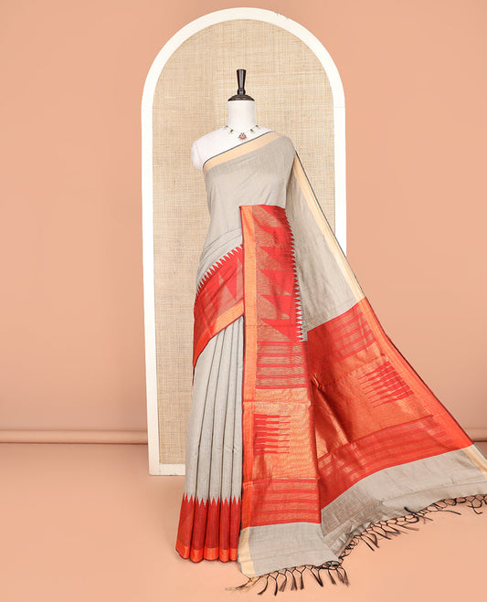 Grey Plain Dupion Silk Saree, Decorated with Contrast Temple Border, Pallu Steeped with Zari Temple Designs, and Paired with a Contrast Blouse