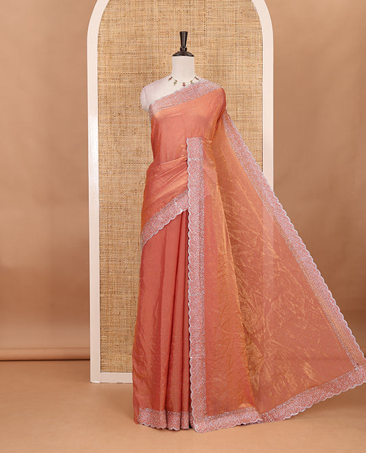 Onion Pink Swarovski crystal stone embedded fendy chiffon saree, scallop Swarovski stone embroidered border, and contrast plain blouse