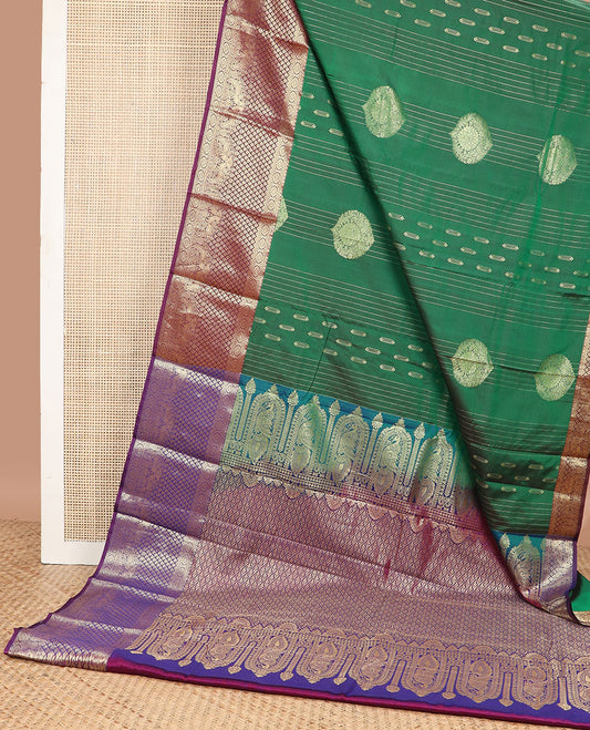 Dark green striped, floral design gift saree with contrast zari design border & argyle design pallu