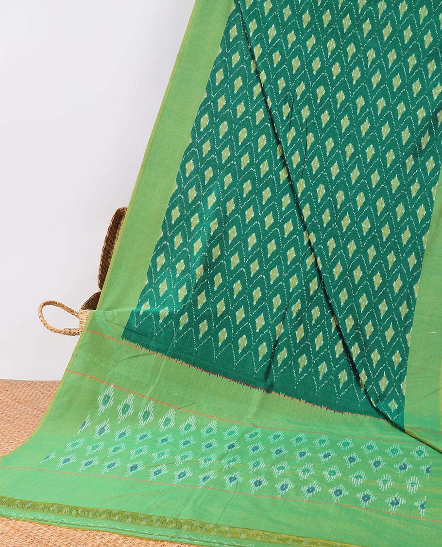 Green argyle design ikkat cotton with contast plain border & intricate butta design pallu