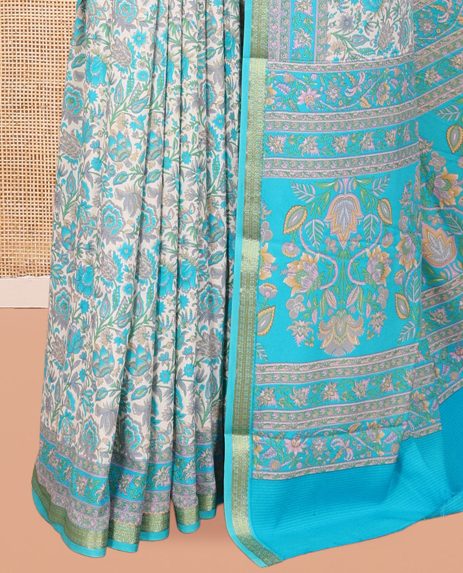 Off White Printed Silk Saree, Spotlighted with Floral-Vine Print, a Contrast Traditional Zari Border, Floral Pallu, and a Contrast Blouse