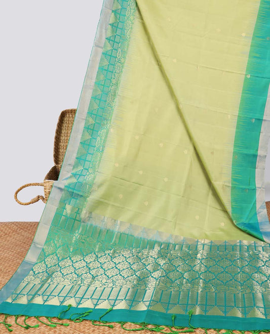 Green buttas soft silk saree with contrast floral border & ogee pattern pallu