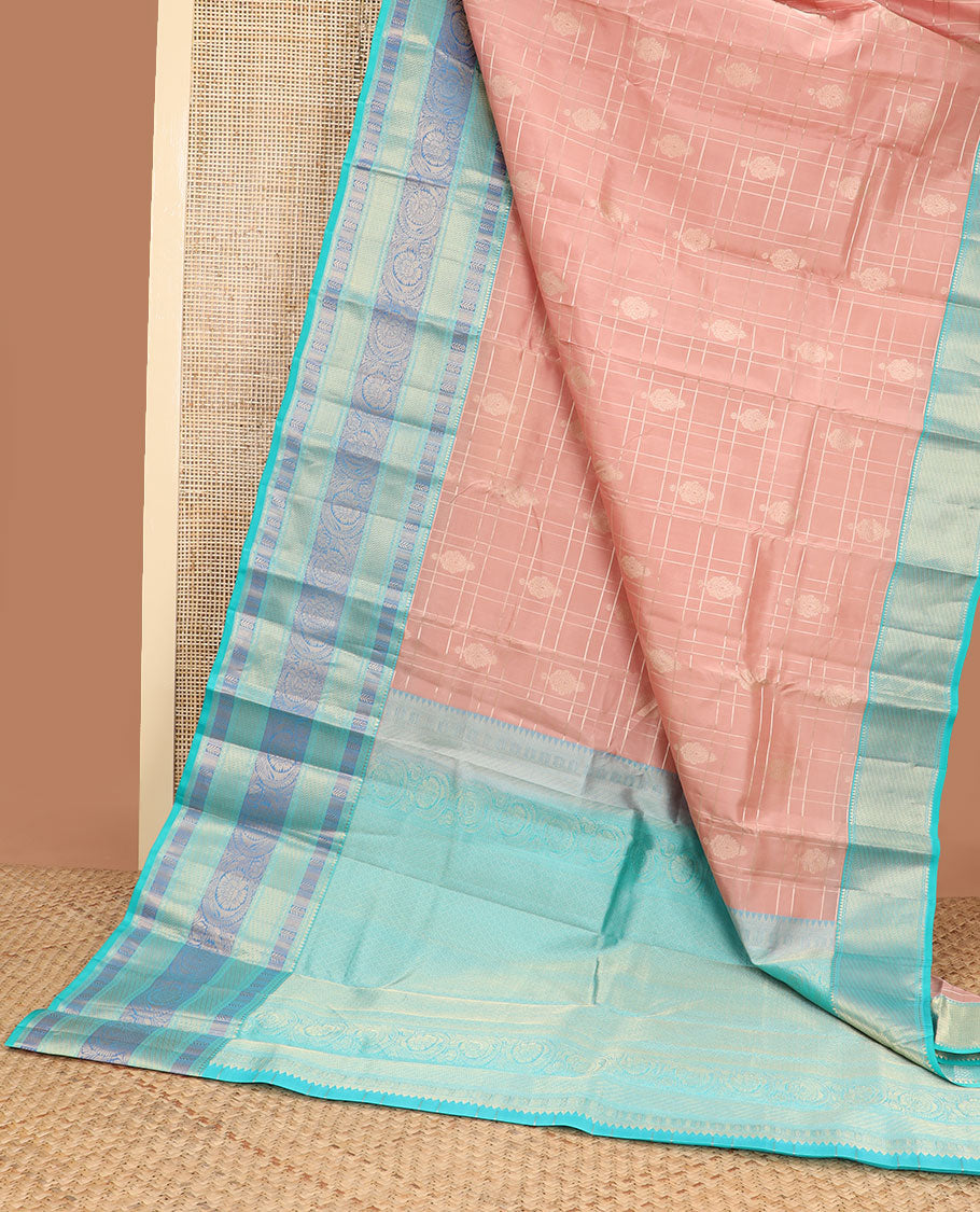 Peach floral buttas silk saree with contrast floral zari design border & geometric design pallu