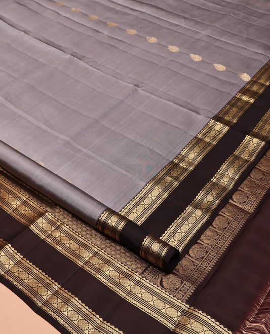 Grey Mayuri Lite Silk Mix Saree, Bedecked with Zari Buttas All Over Its Body, Complemented by Contrast Rettai Pettu Border of Rekku, Kathir, Muthu, Banaras, and Laddu Kamalam Designs, Jaal Pallu, and Paired with Contrast Blouse
