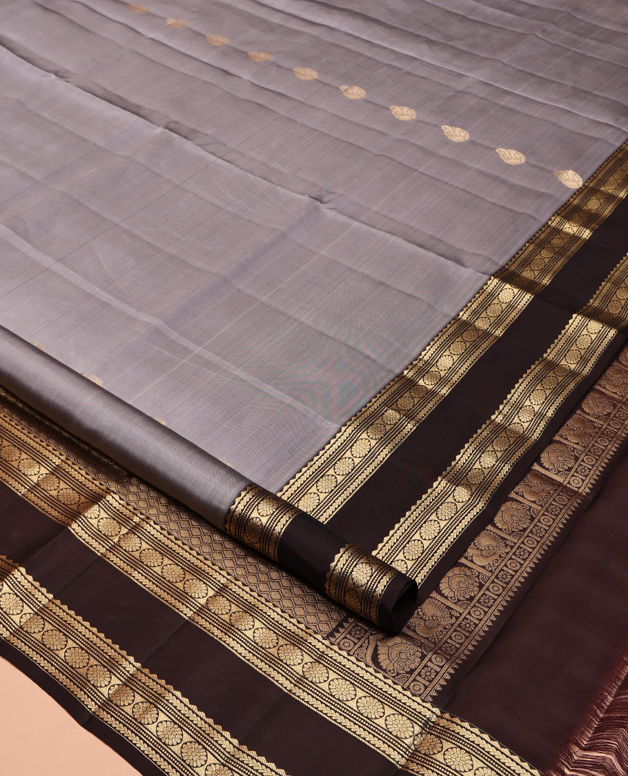 Grey Mayuri Lite Silk Mix Saree, Bedecked with Zari Buttas All Over Its Body, Complemented by Contrast Rettai Pettu Border of Rekku, Kathir, Muthu, Banaras, and Laddu Kamalam Designs, Jaal Pallu, and Paired with Contrast Blouse