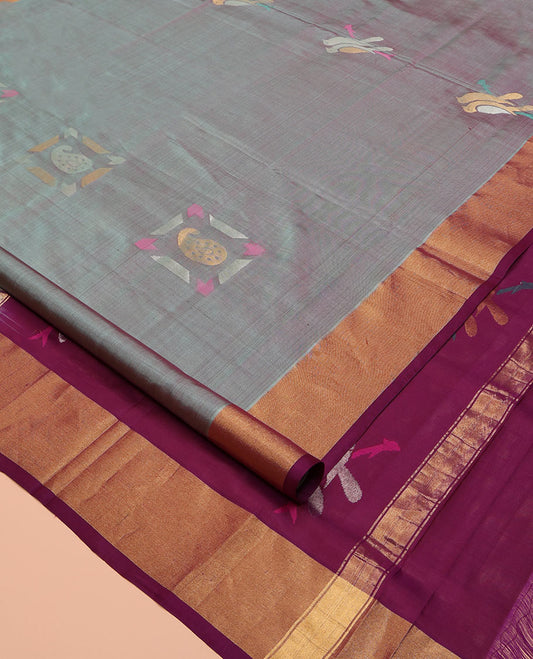 Grey Uppada Silk Saree, Elevated with Meena Buttas All Over Its Body, Complemented by Contrast Zari Bavanji Border, Captivating Contrast Pallu Steeped with Meena Buttas, and Paired with a Contrast Blouse