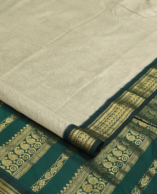 Grey buttas nine-yard cotton saree, contrast traditional zari border, and pallu of traditional designs