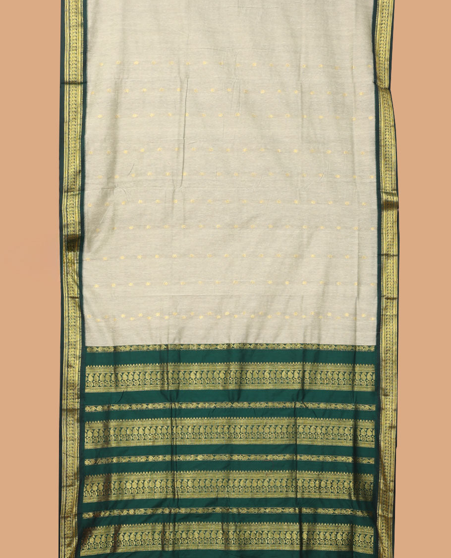 Grey buttas nine-yard cotton saree, contrast traditional zari border, and pallu of traditional designs