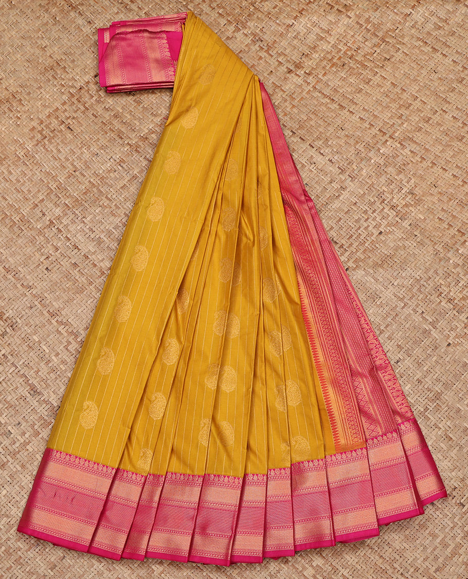 Mustard Budget Silk Saree, Accentuated with Paisley Buttas and Stripes All Over Its Body, Complemented by a Contrast Traditional Zari Border, Grand Pallu, and Paired with a Contrast Blouse
