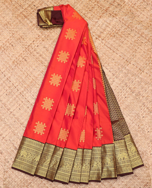 Orange Budget Silk Saree Features Kolam Buttas, Complemented by a Contrast Traditional Zari Border, Grand Pallu, and a Contrast Blouse