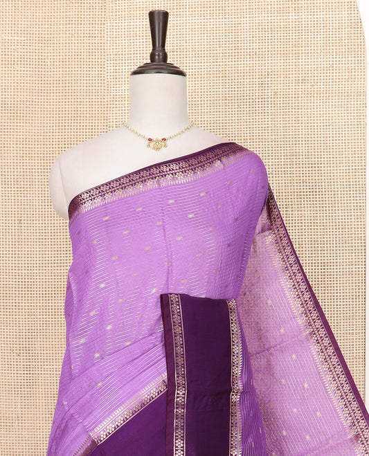 Lavender Assam Silk Saree Woven with Zari Buttas and Stripes, Complemented by a Contrast Traditional Zari  Design Border, a Captivating Pallu Featuring Zari Designs, and Paired with a Contrast Blouse