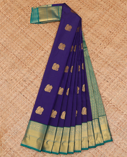 Blue Budget Silk Saree Gleamed Up with Buttas, Highlighted with a Contrast Traditional Zari Design Border, Pallu of Jaal Design, and Paired with a Contrast Blouse