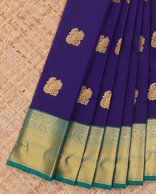 Blue Budget Silk Saree Gleamed Up with Buttas, Highlighted with a Contrast Traditional Zari Design Border, Pallu of Jaal Design, and Paired with a Contrast Blouse