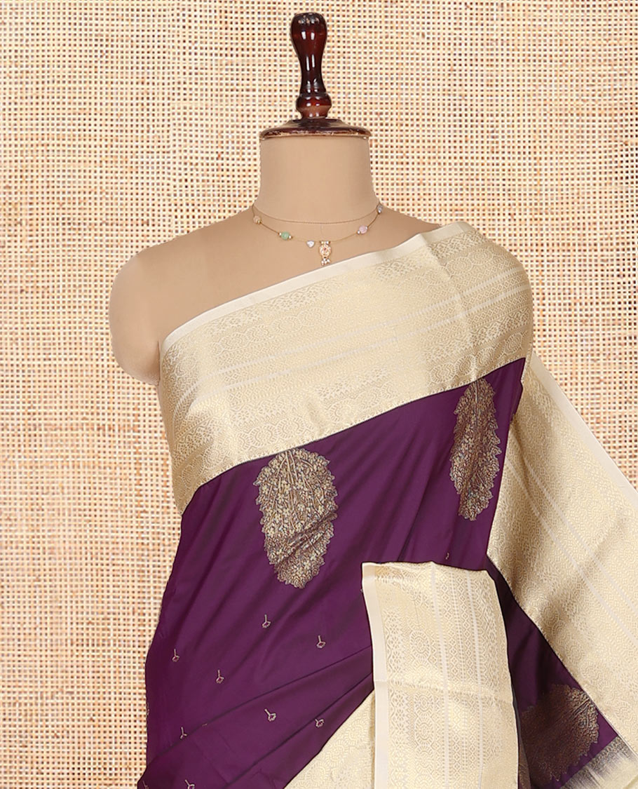 Purple Budget Silk Saree, Lightly Embellished with Zari Buttas on Its Body, Complemented by a Contrast Traditional Zari Design Border, Sparsely Woven Pallu, and Paired with a Contrast Blouse