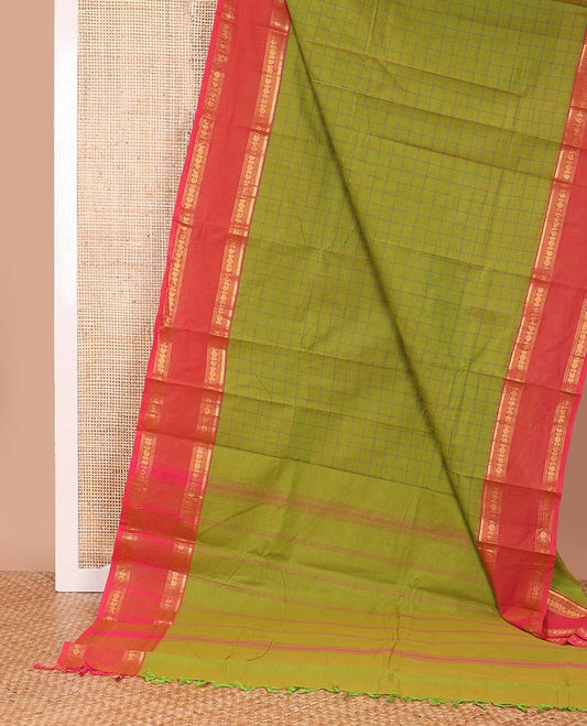 Green checked design chettinad cotton saree, contrast rettai pettu traditional zari border, and striped pallu