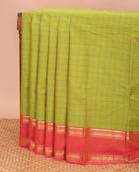 Green checked design chettinad cotton saree, contrast rettai pettu traditional zari border, and striped pallu