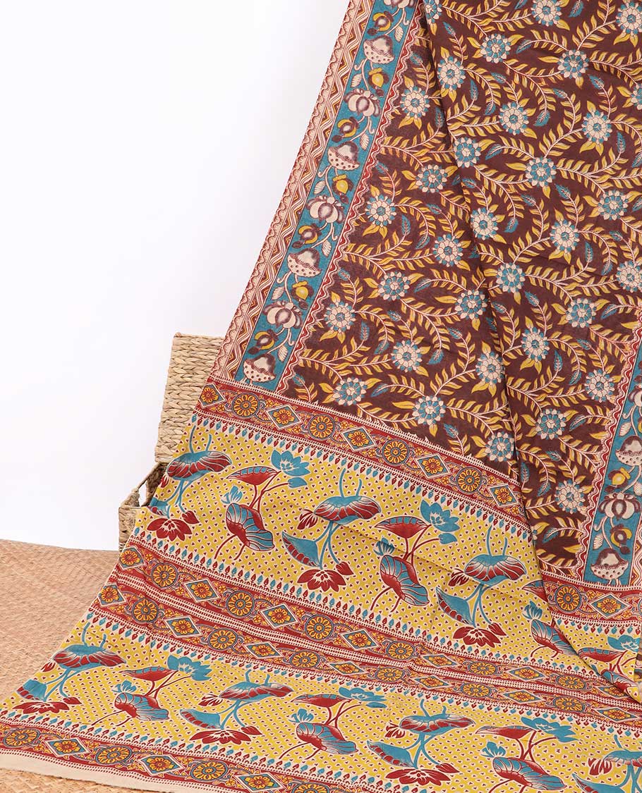 Brown floral design machine-printed kalamkari cotton saree with contrast floral border & intricate floral design pallu