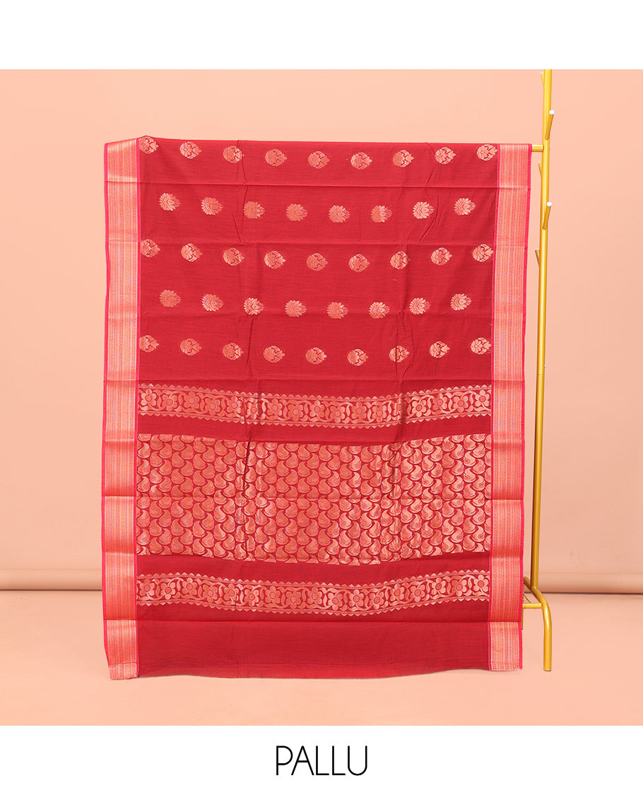 Red Semi-Silk Cotton Saree, Zari-Gleamed Up with Buttas All Over Its Body, Highlighted by a Traditional Zari Border, Pallu of Paisley Designs, and Paired with a Matching Blouse