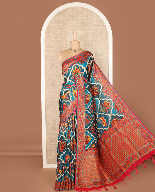 Blue ikkat design printed dola silk saree, contrast floral vine, and peacock border, and jaal pallu