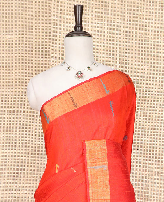 Red Dupion Silk Saree Decked Up with Muniya Buttas All Over Its Body, Subtly Self-Zari Border of Muniya Designs, Colorfully Woven Pallu of Unique Motifs, and Paired with a Matching Blouse
