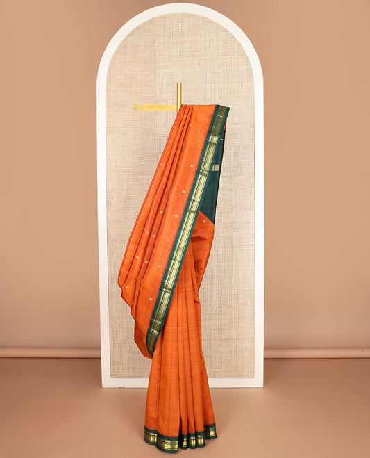Orange zari buttas kanchipuram silksaree, contrast one-sided border of manga,banaras & mayil kann & zari design pallu