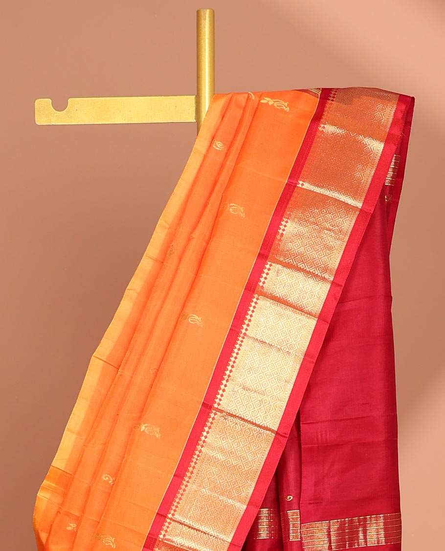 Orange  floral buttas kancheepuram silk saree with contrast border of sombu,banaras, jaal design & zari design pallu
