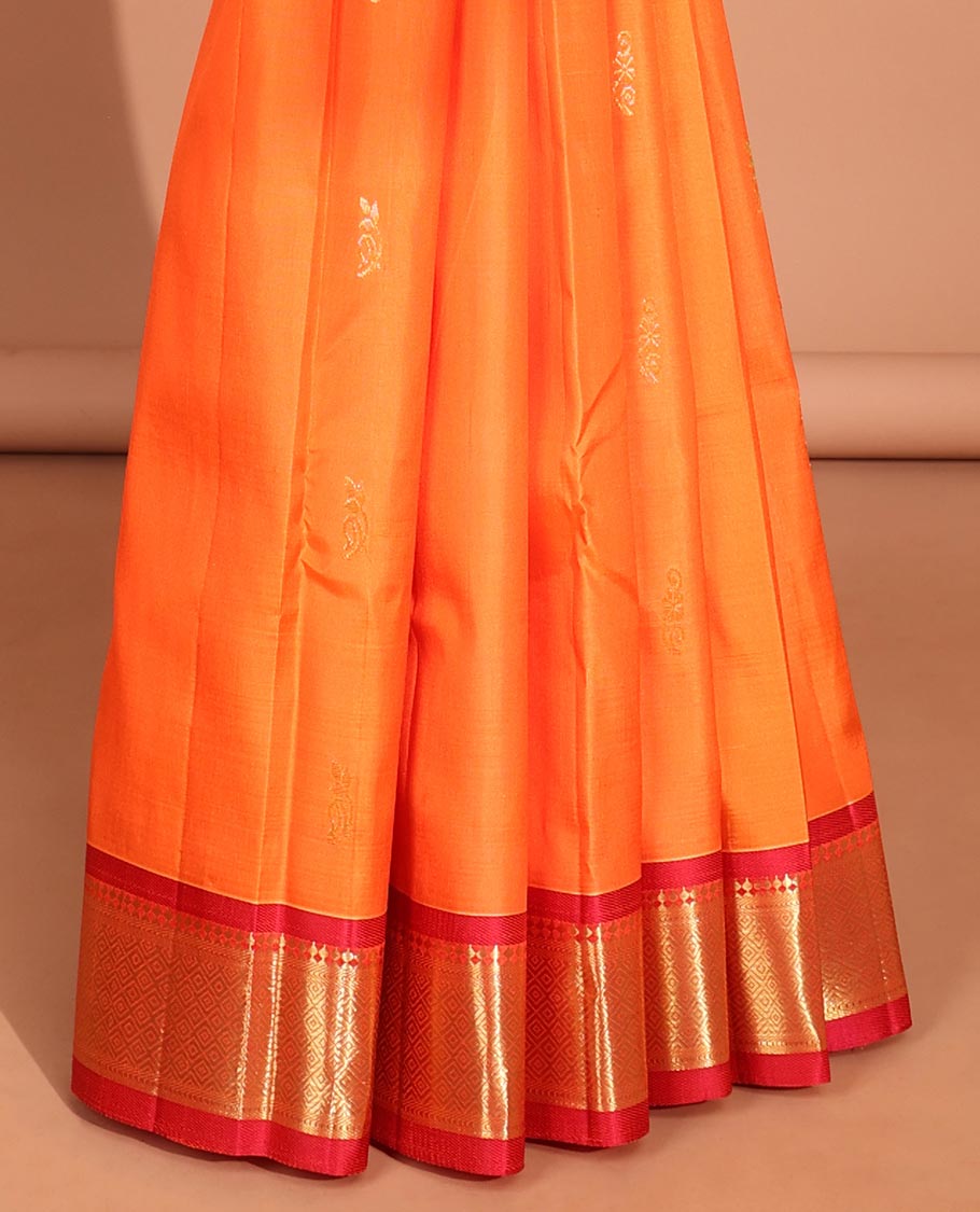 Orange  floral buttas kancheepuram silk saree with contrast border of sombu,banaras, jaal design & zari design pallu